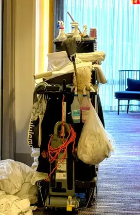 The typical hotel housekeeping trolley with Tersano SAO, a single spray bottle filled from the Lotus Pro V9 replaces most of them.